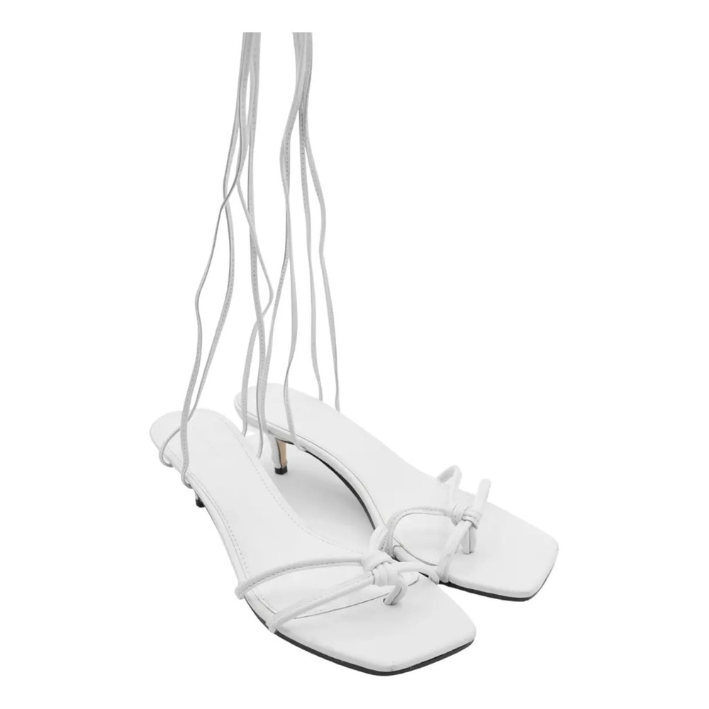 White kitten heels